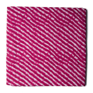 Pink and white printed cotton fabric with leheriya print